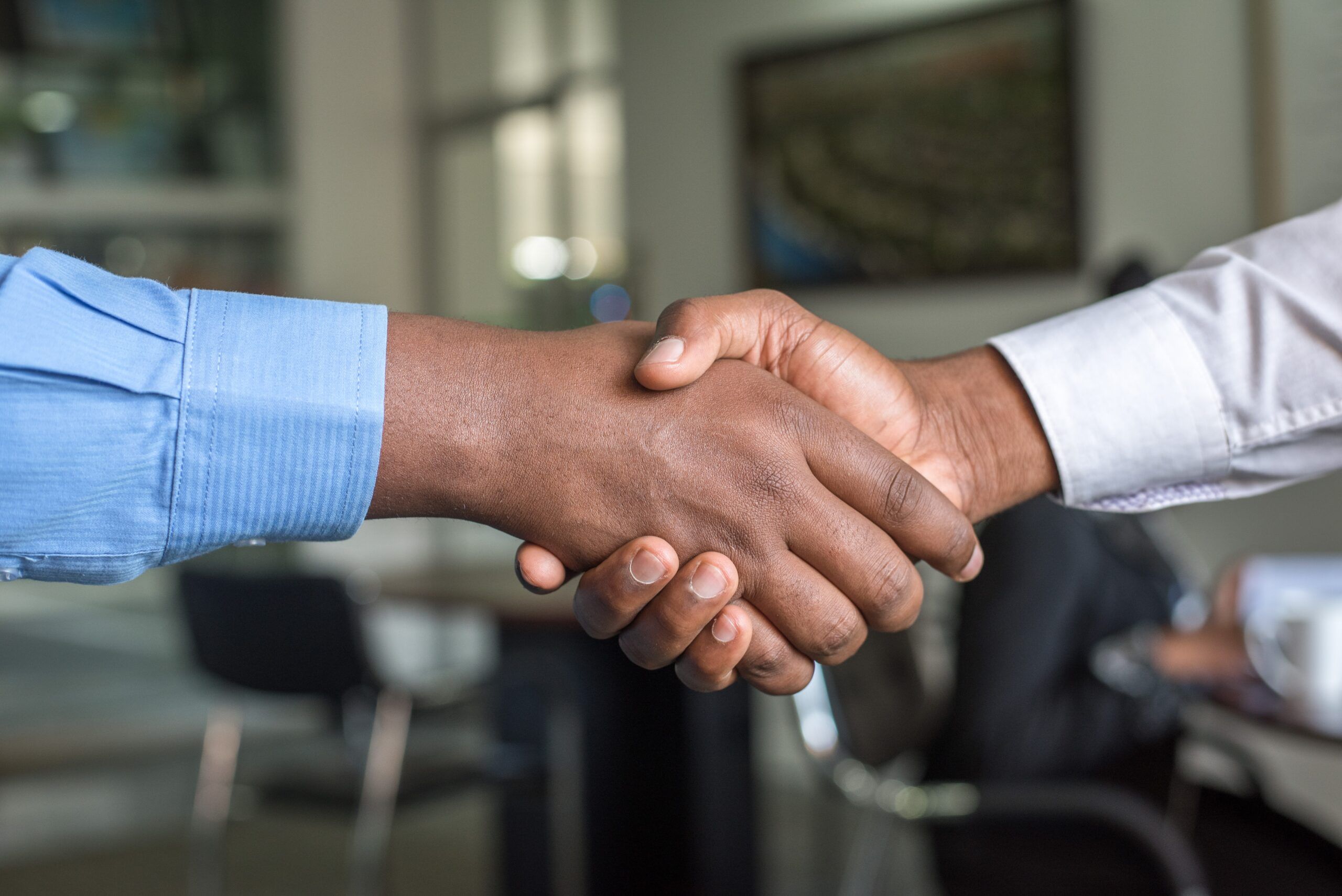 handshake to greet a referred employee